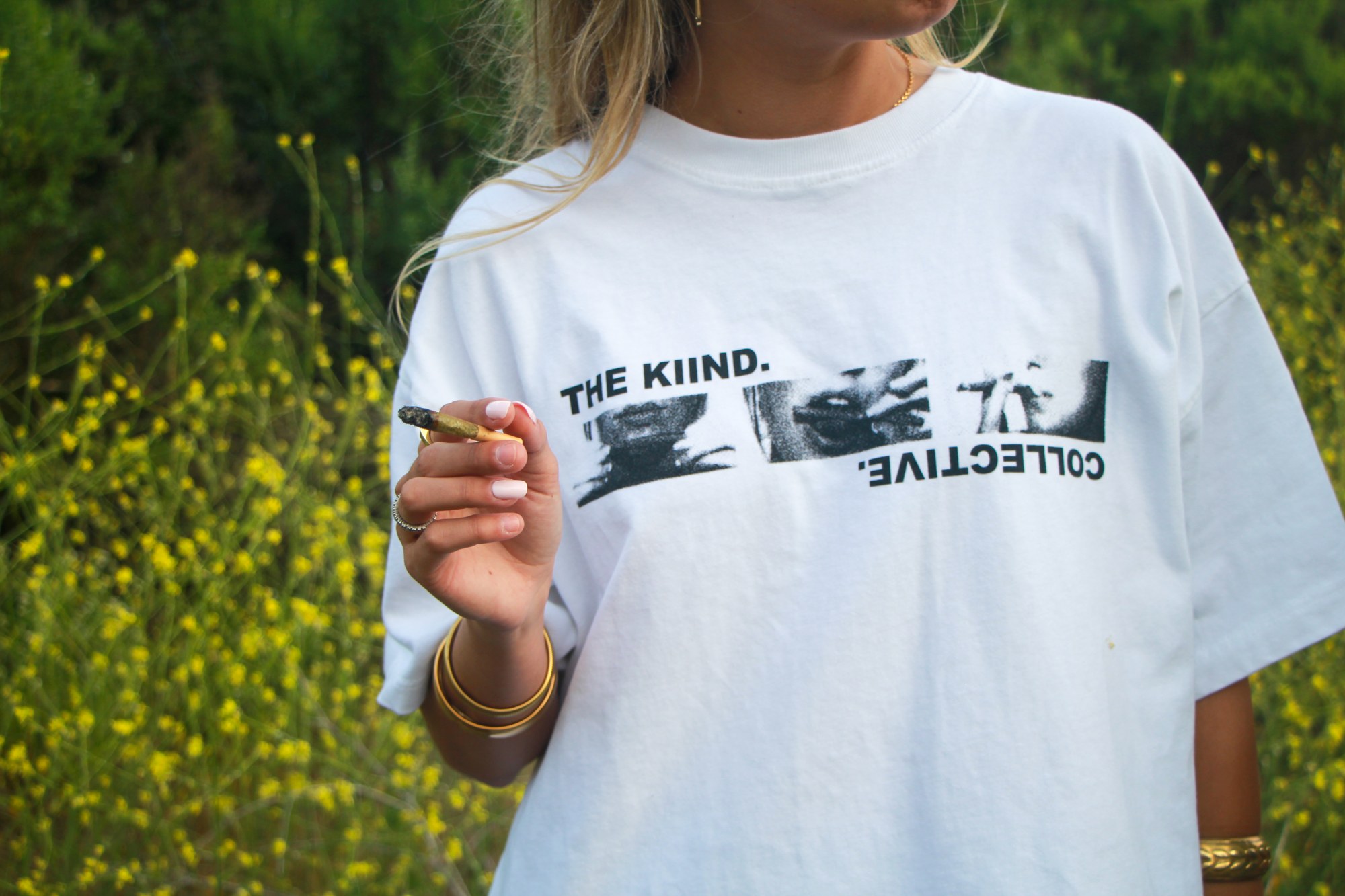 White Collective V1 tee photographed outdoors